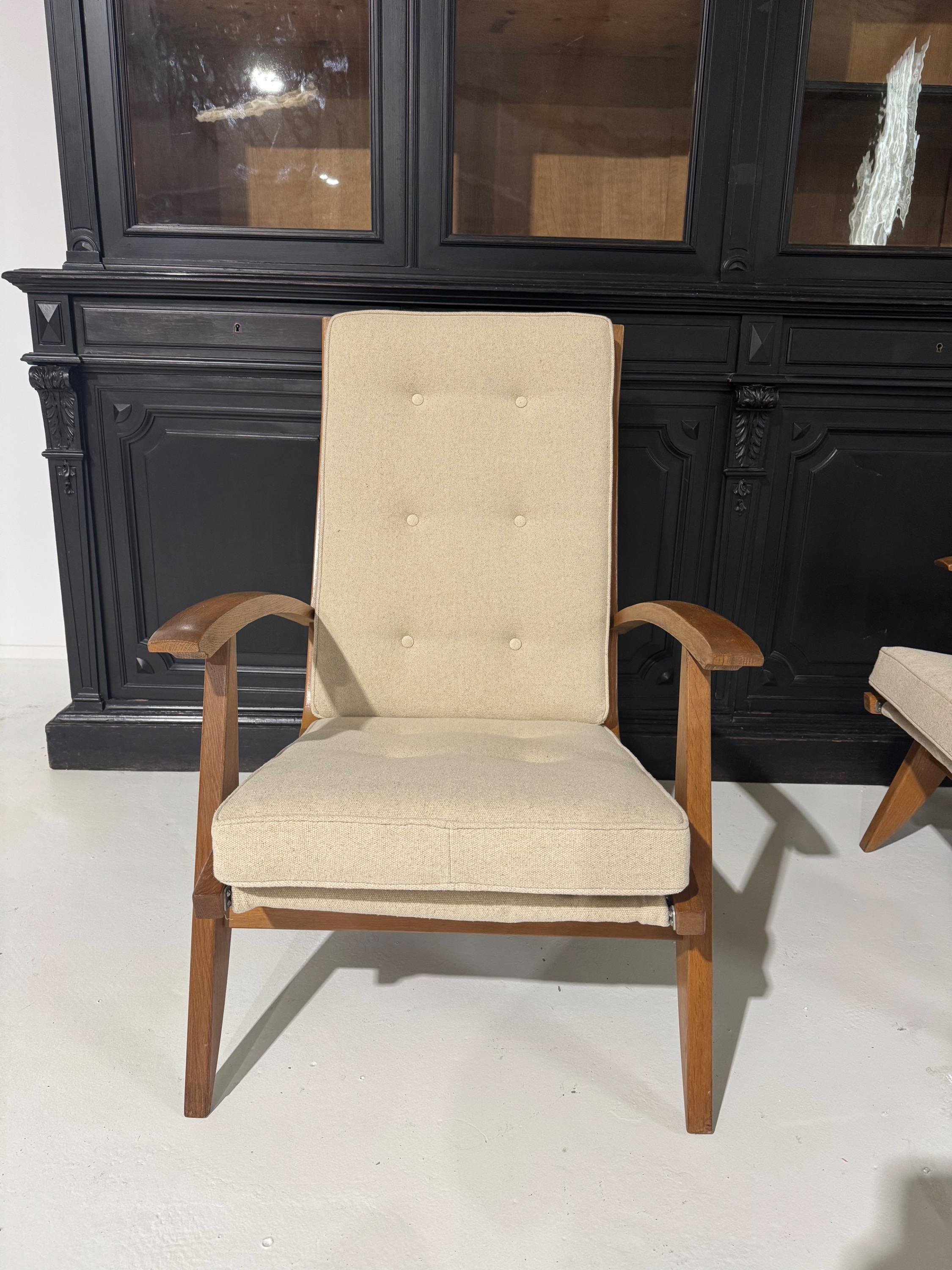 Pair of French Armchairs & Footstool by Guy Besnard FS134 édition Free-Span Circa 1950,covered in Natural Linen.