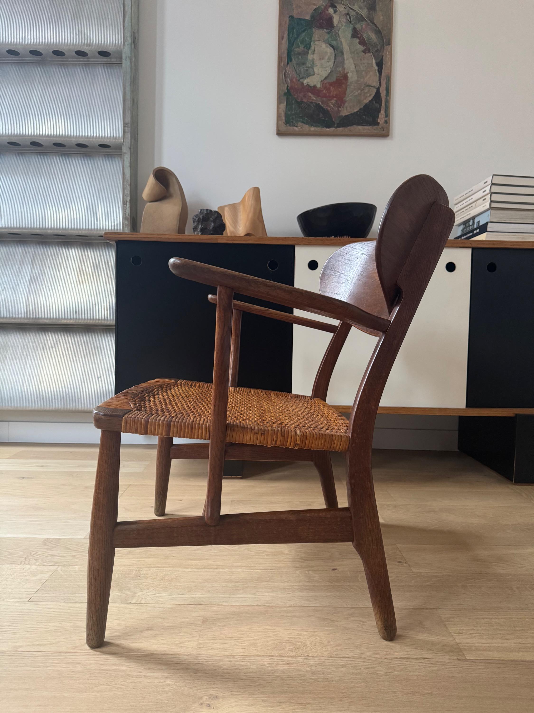 Rare First Edition of The Iconic CH 22 Armchair By Hans J. wegner, 1950. Untouched, in Full Original Vintage Condition.